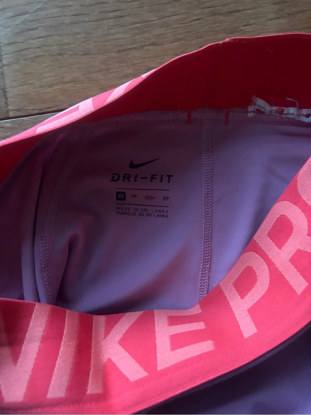 Nike Pro Women’s Pink Training Shorts with Coral Branded Waistband